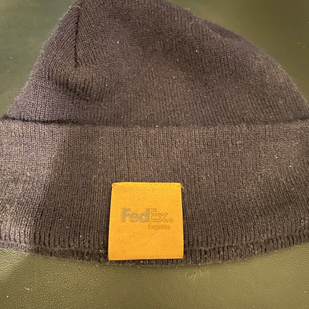 FedEx beanies and 1 pair of FedEx gloves
